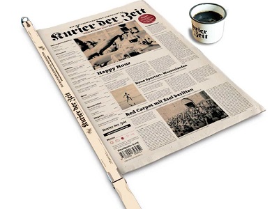 www.kurierderzeit.de Zeitung und Kaffeetasse